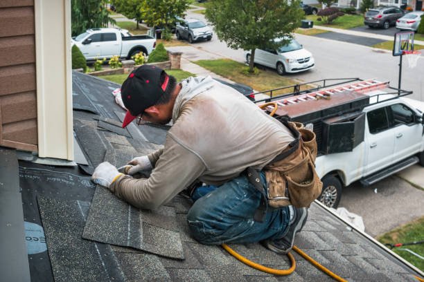 Professional Roofing technician working in Belding, MI